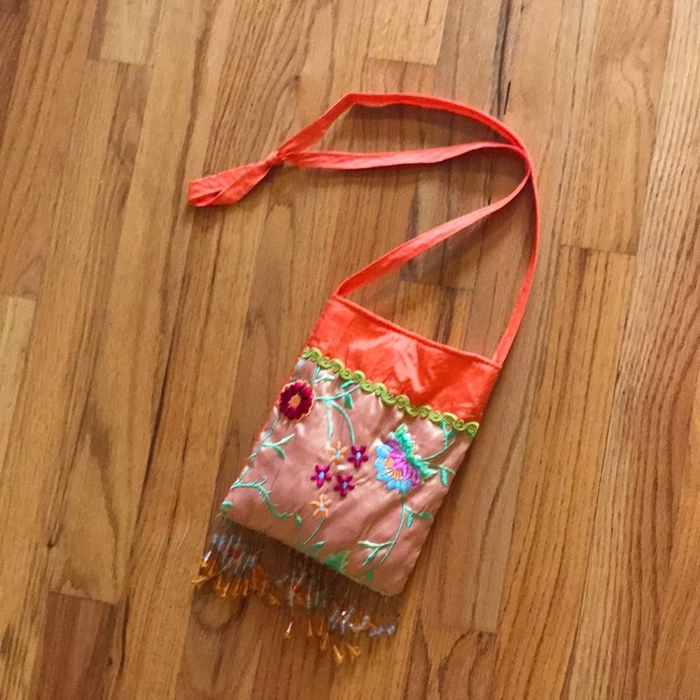 Ladies mini bag , nylon with snap/magnetic closure.